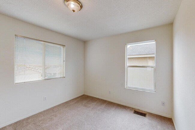 Building Photo - 6056 Malpais Park Ave NW