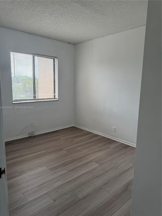 Building Photo - 10916 Royal Palm Blvd
