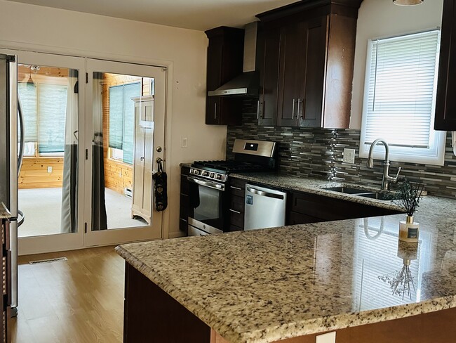 Kitchen/ sunroom view - 20 Morgan Way