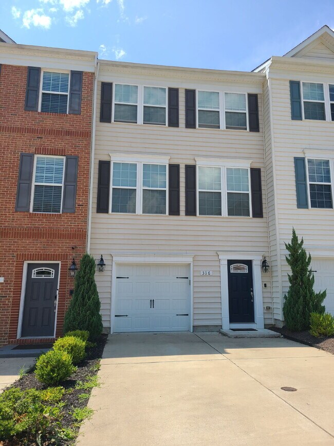 Primary Photo - 3-Story Townhouse with Attached Garage in ...