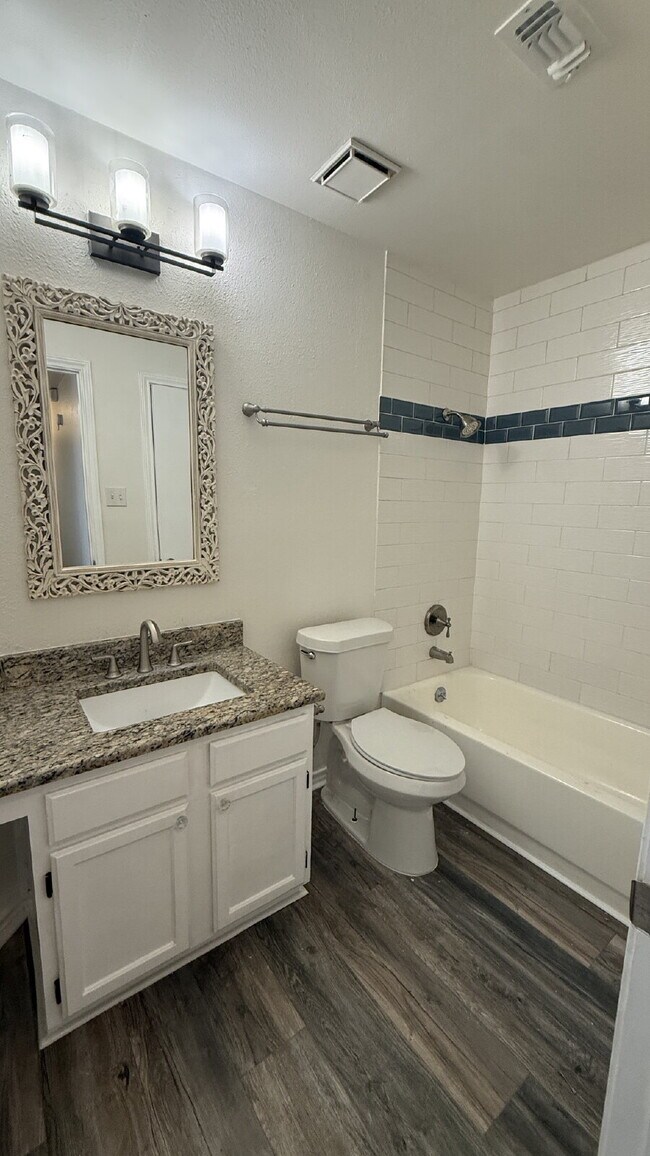 Building Photo - Updated 4-Bedroom 2 Bathroom Austin Home with Beautiful Backyard
