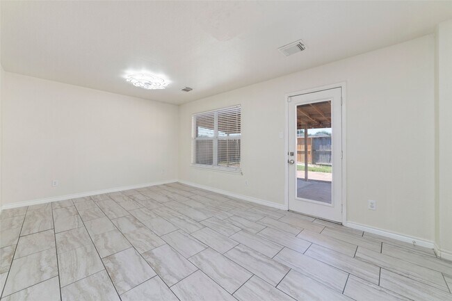 Building Photo - 8418 Village Rose Ln