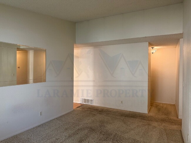 Building Photo - Single-Level 3-Bedroom Townhome with Primary Suite & Attached Garage