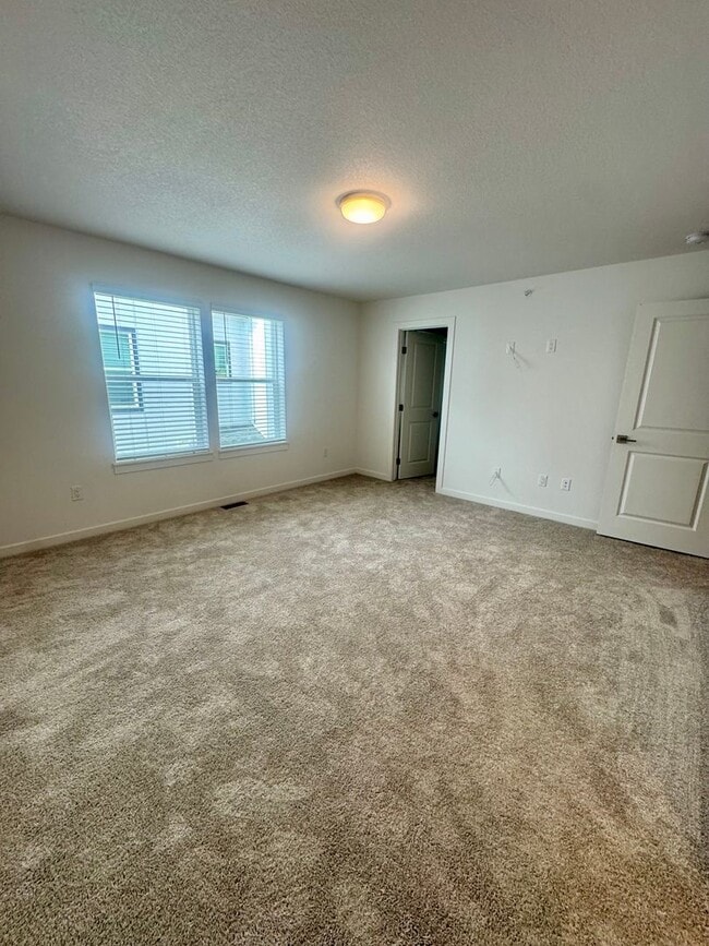 Building Photo - NEW construction 3 bedroom luxury townhome