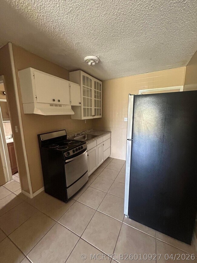 Building Photo - 8657 64th Ct