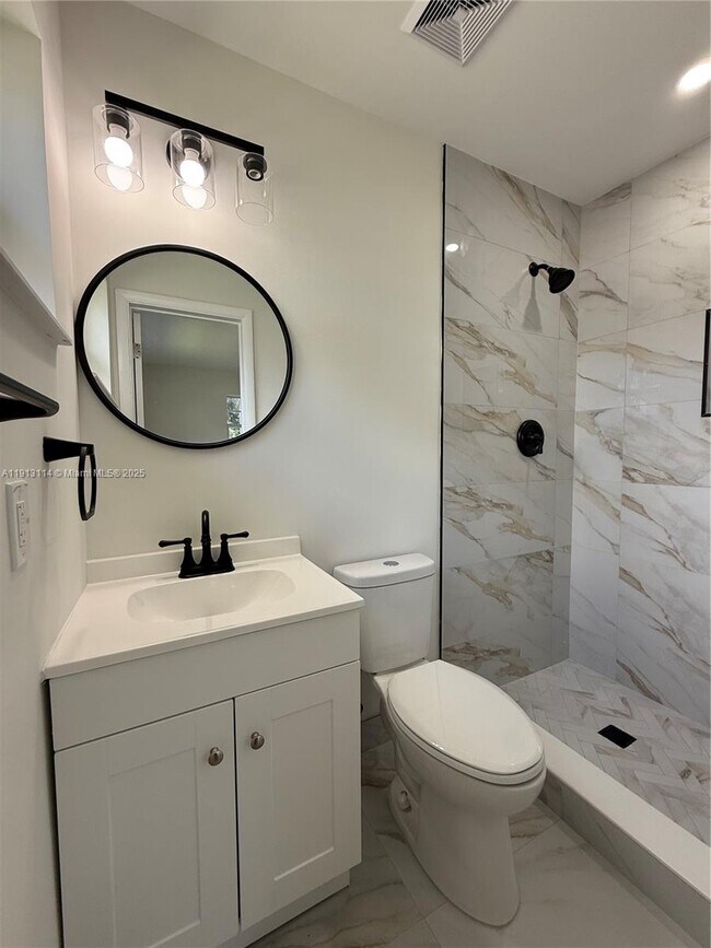 Building Photo - 6570 NW 6th Ct