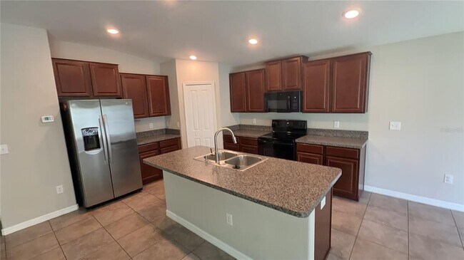 Building Photo - 7419 Rosy Periwinkle Ct