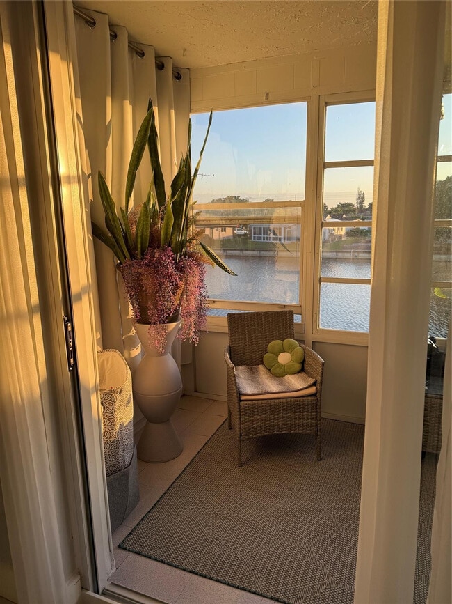 Building Photo - 9360 Lime Bay Blvd