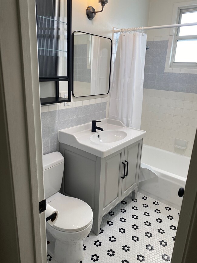 Fully renovated hall bathroom - 228 W Walnut Ave