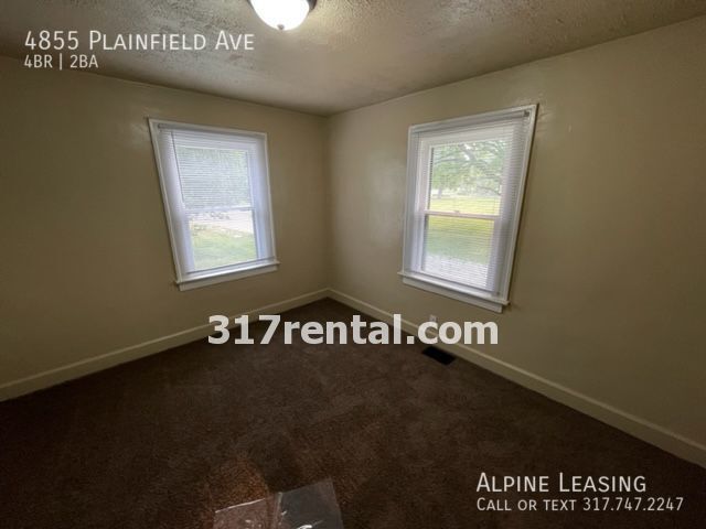 Building Photo - 4/2 with huge 2-car garage/workshop combo ...