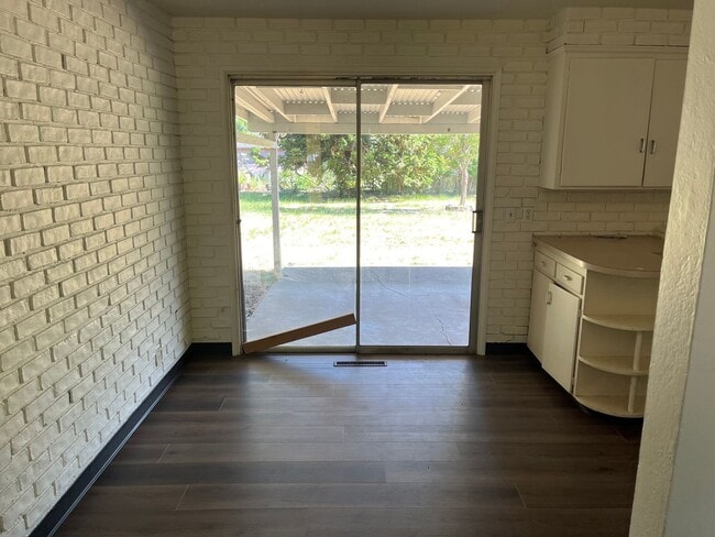 Building Photo - New flooring, New Paint. Garage & Carport