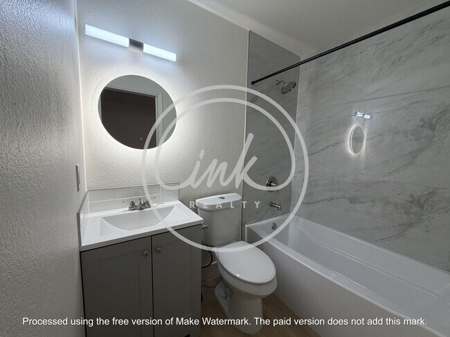 Building Photo - Newly Renovated 3 Bedroom Townhome