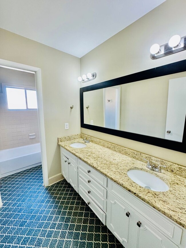 Building Photo - Updated 4-Bedroom Ranch with the layout everyone wants