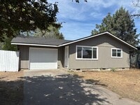 Building Photo - Three-Bedroom home with large backyard