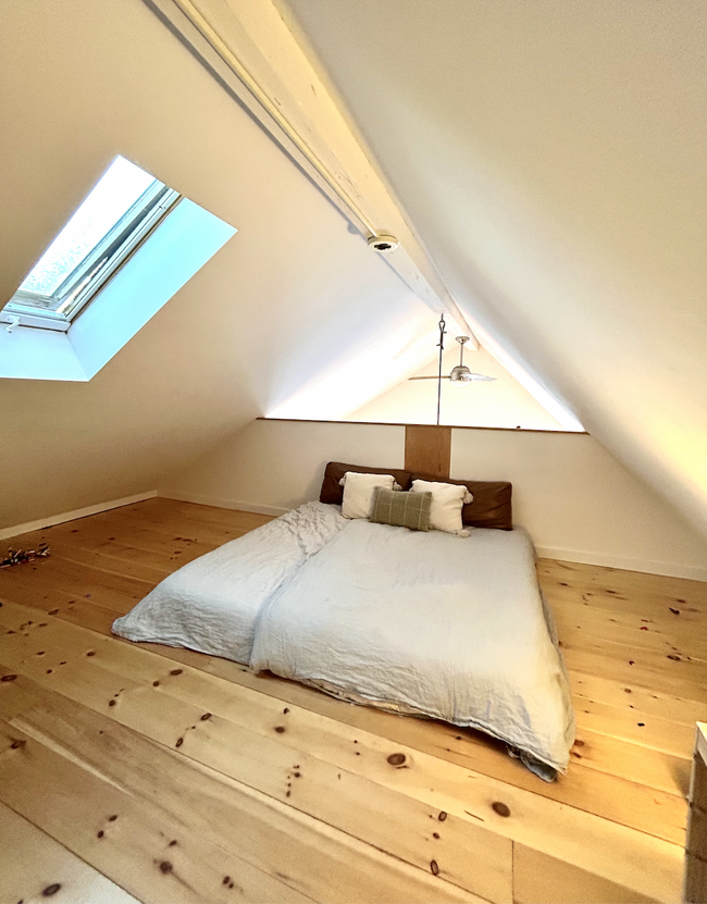 2nd bedroom is a roomy loft with skylight that fits a king sized bed very comfortably. - 67 Regatta Dr