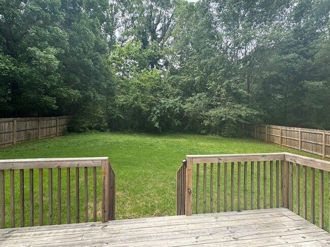 Building Photo - Spacious 4-Bedroom Home on Large Corner Lo...
