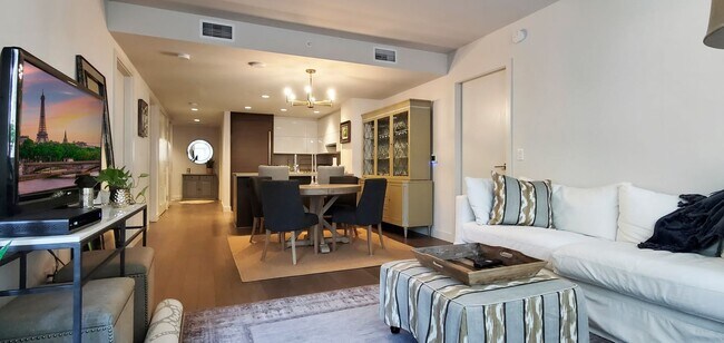 Building Photo - One of kind 7th terrace unit in reputable ...