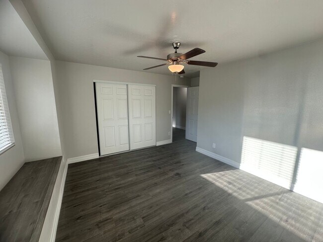 Building Photo - Quiet neighborhood, 3 bedroom, 2 bath home, huge front patio/deck, RV parking!