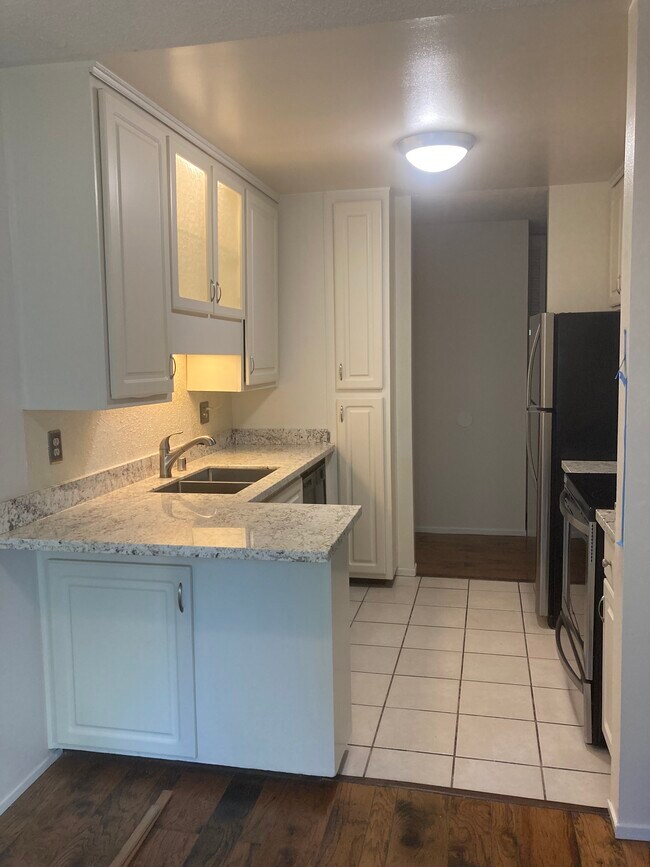 New granite counter seating space - 1241 Homestead Ave