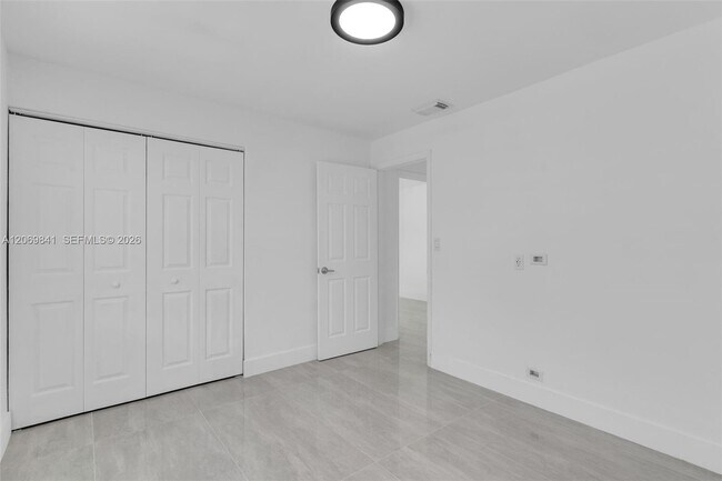 Building Photo - 9999 NW 25th Terrace