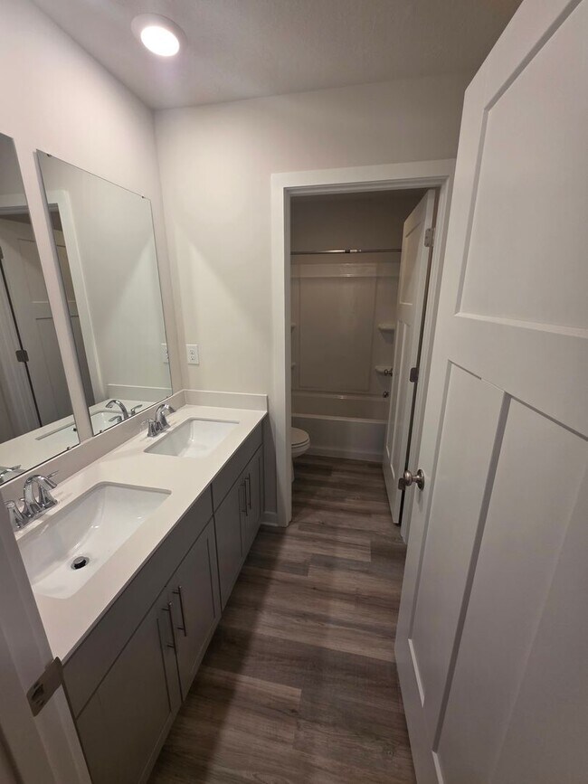 Building Photo - Luxury 4-Bedroom Townhome with Finished Walkout Basement & River Views