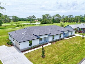 Building Photo - Brand New Townhome Overlooking the 15th Fairway