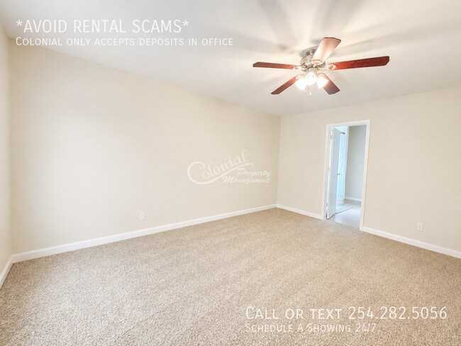 Building Photo - 5406 Boot Scootin Ct