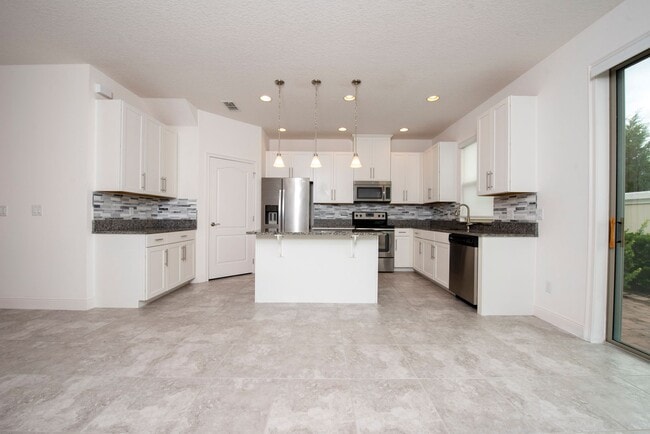 Building Photo - Two story Townhouse 2-bedroom, 2.5 bath in Eagle Creek of Lake Nona