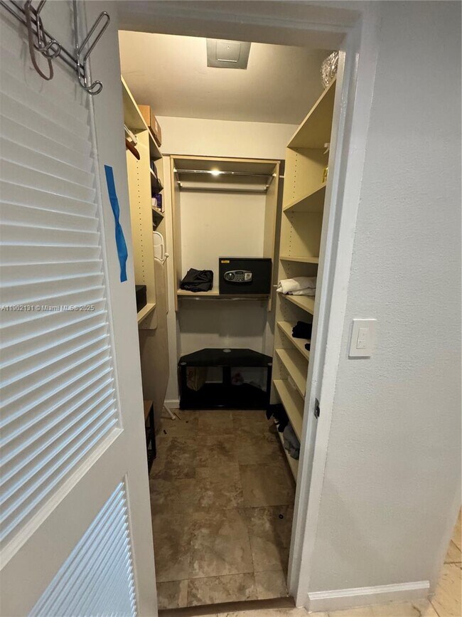 Building Photo - 10275 Collins Ave