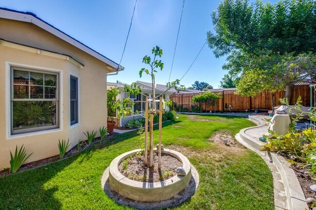 Building Photo - Turnkey Home with Natural Light & Upgrades...