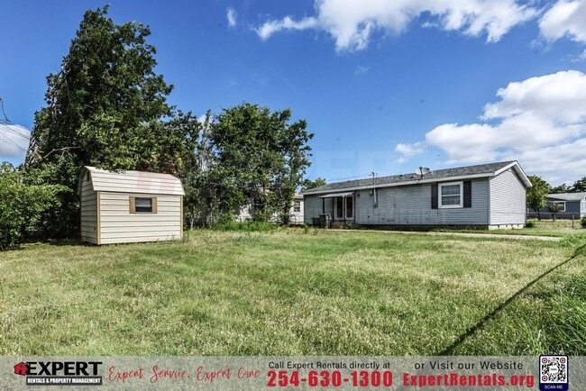 Building Photo - A cozy 3-bedroom, 2-bathroom home nestled on a corner lot