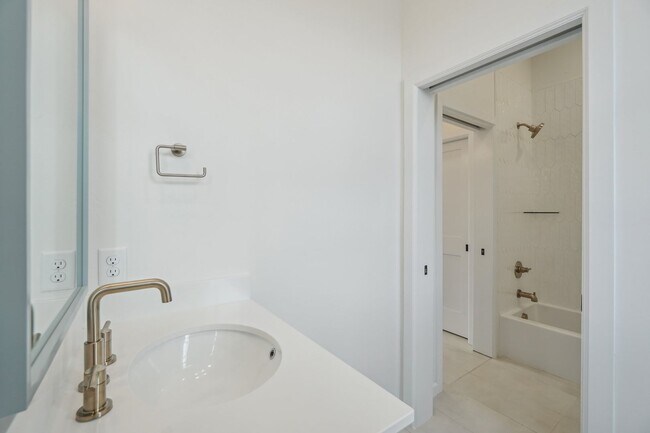 Building Photo - Classic Cape Cod Meets Modern Glam: Your D...