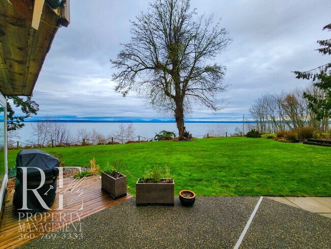 Building Photo - MOVE-IN SPECIAL: 50% OFF FIRST MONTHS RENT - Waterfront Rustic Retreat with Vaulted Ceilings, Pic...