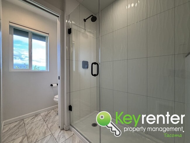 Building Photo - Stylish 4-Bedroom Home with Finished Basem...