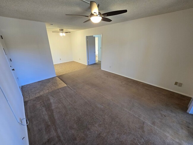 Building Photo - Move-In Special: 1/2 off 1st Month's Rent!!!  Freshly Painted 1-Bedroom Condo with Covered Parking