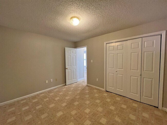 Building Photo - 6017 Tennyson Dr