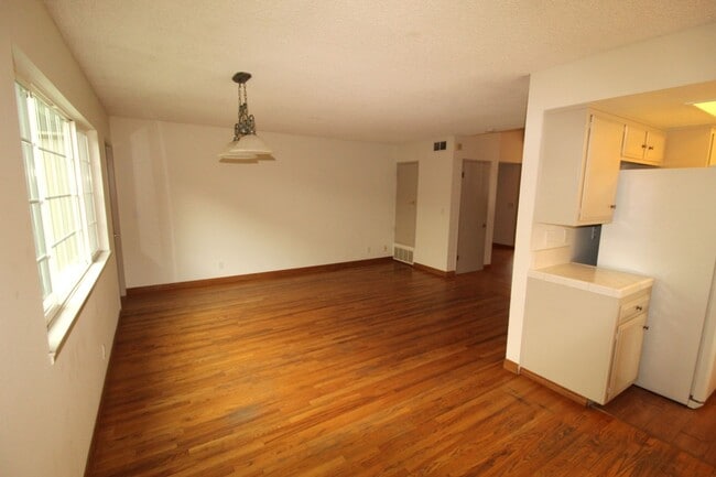 Building Photo - Spacious Corner Lot Home in Desirable Vent...