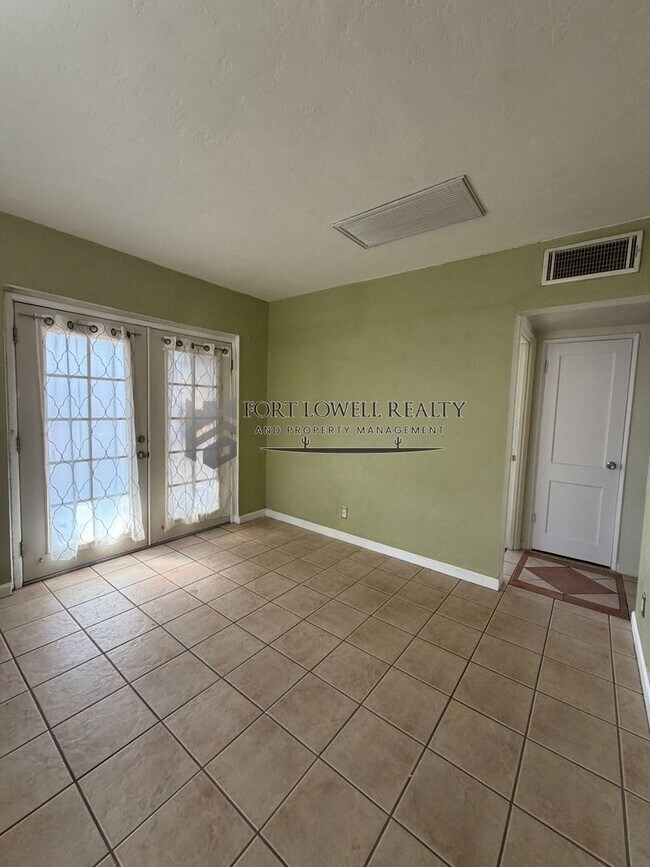 Building Photo - Welcome to this charming 2-bedroom, 1-bathroom + Den!