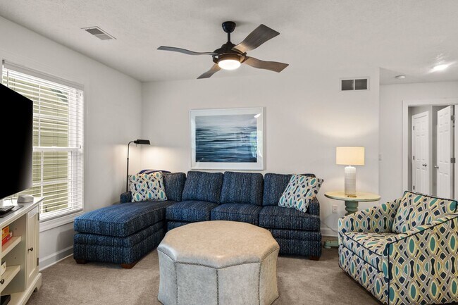 Building Photo - Furnished Pet-Friendly 30-Day Extended Stay Riverfront Condo