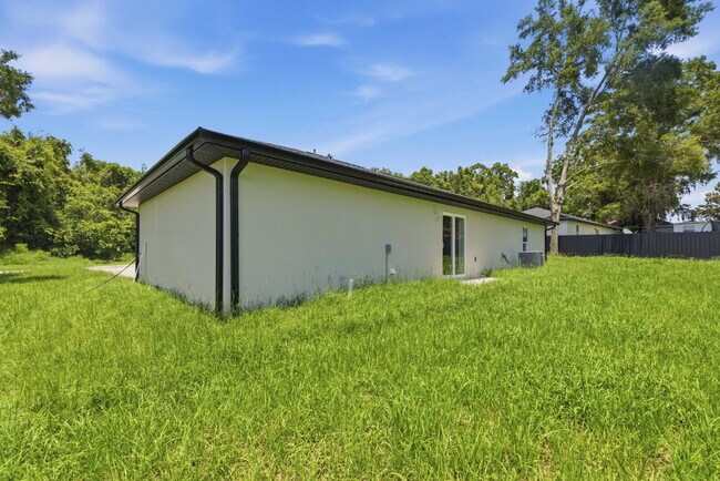 Building Photo - Available Now! New 3/2 Home with Large Backyard and Front Porch