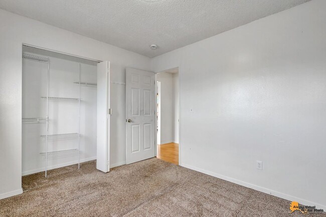 Building Photo - Cozy Abbott Loop Single Family Home w/ Garage & Fenced in Yard