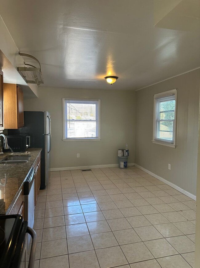 Building Photo - Spacious Renovated Home! Den Space & Bonus Recreation Room in Basement! Central Air! W/D! 2 Car G...