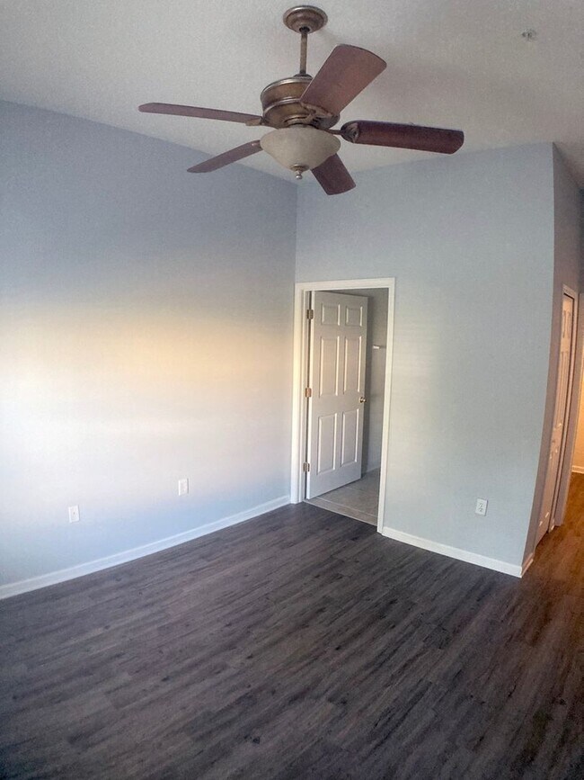 Building Photo - Spacious 3-Bedroom Condo with Pond Views &...