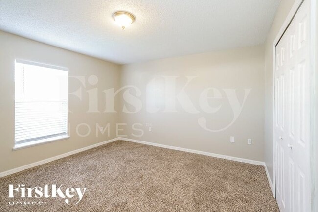 Building Photo - 10714 Opus Dr