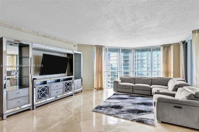 Building Photo - 16711 Collins Ave