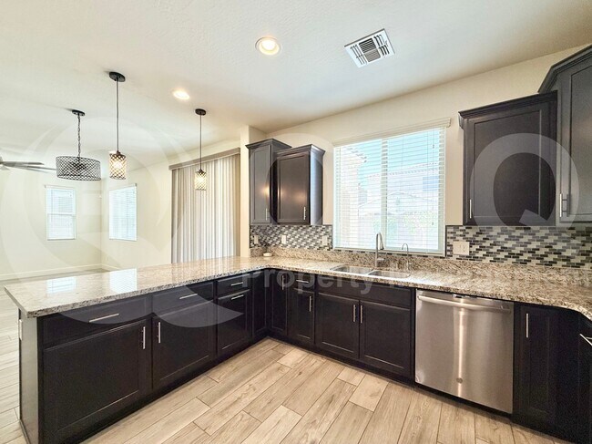 Building Photo - 9576 W Donald Dr
