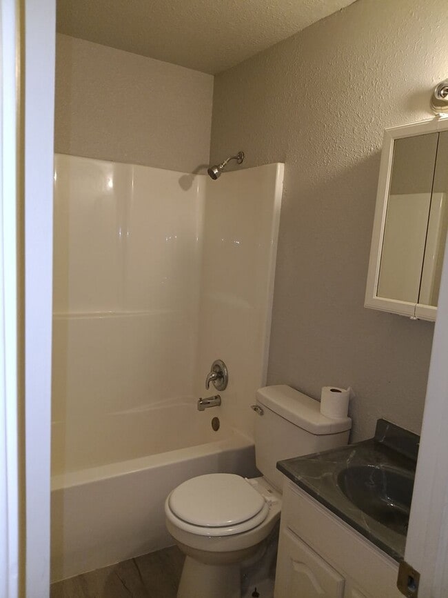 Building Photo - Two bedroom home with over half of acre  o...