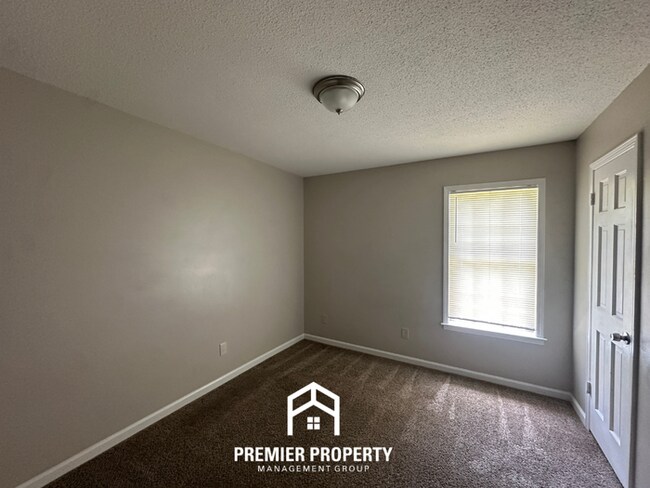Building Photo - Gorgeous 4BR/2BA Bartlett Home with Brick Fireplace & Spacious Fenced Yard!