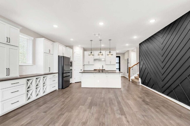 Building Photo - "Spacious 4-Bedroom Sanctuary with Cozy Fireplace in San Antonio's Prime Location!"