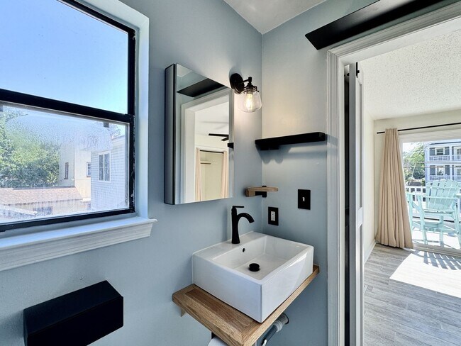 Building Photo - Ready NOW! A Custom Townhouse-Style Duplex Blocks to the Beaches! Fenced Yard - Hot Tub - Pet Fri...